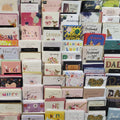 Display of various greeting cards with different designs and text.