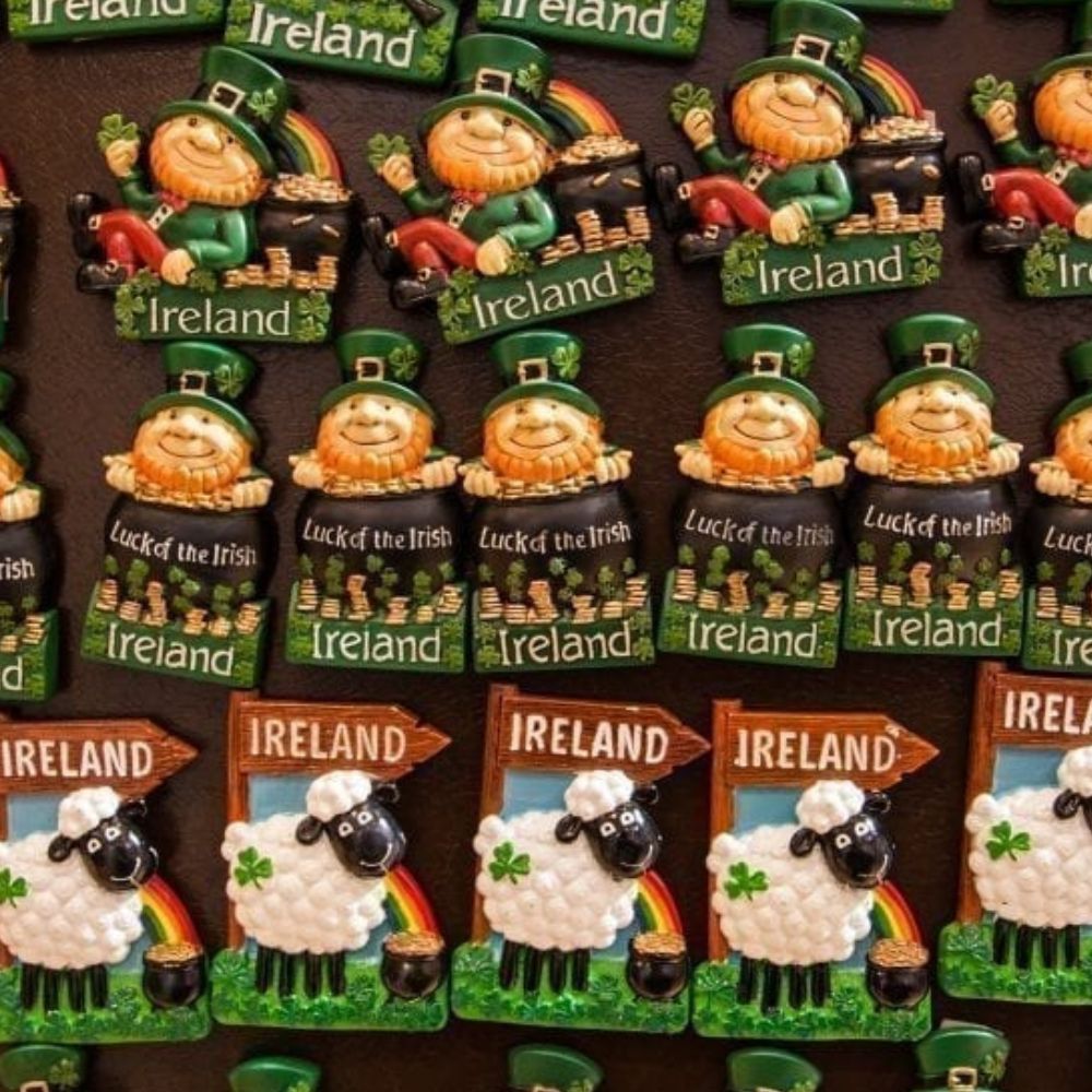 Collection of Irish-themed magnets on a brown background